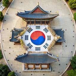 Aerial View of a Building with a Korean Flag on the Roof