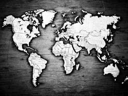 Black and White World Map on a Wooden Background