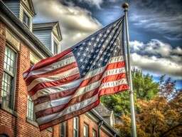 American Flag Flying in Front of a Brick Building