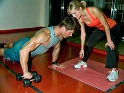 Group of People Working Out in a Gym