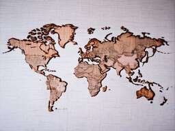Wooden World Map Hanging on a Wall
