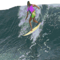 Person Riding A Wave on A Surfboard