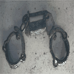 회색 표면에 녹슬지 않는 금속 handcuffs