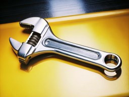 노란색 surface 위의 vector illustration wrench