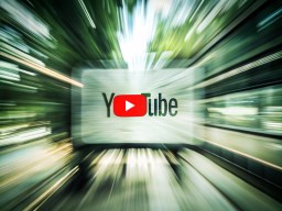 television screen 위의 youtube logo is seen