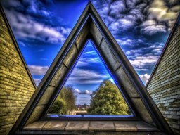 하늘을 배경으로 한 triangle shaped building