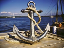 boat을 배경으로 한 anchor 위의 부두