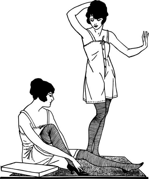 Woman Sitting On A Bed With A Man Standing Next To Her