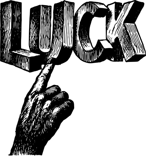 블랙 And White Image Of A Hand Holding The Word Luck