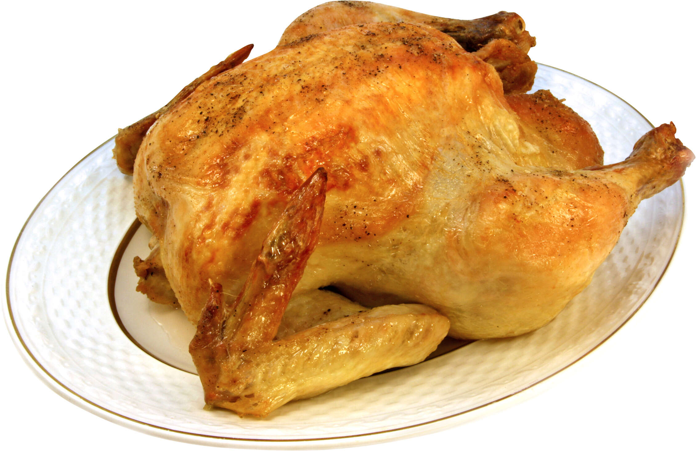 Chicken sitting on a plate on the table