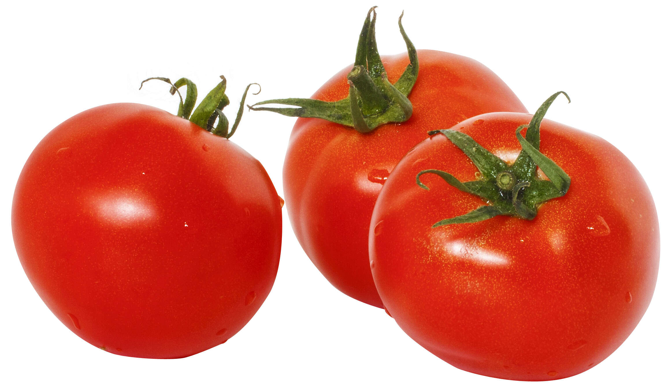 Three tomatoes sitting next to each other on a white surface