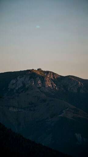 A Mountain With A Moon In The Sky