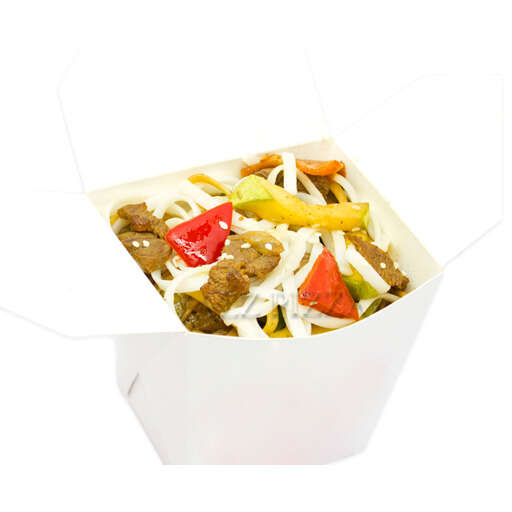 a white box filled with food that includes meat and veggies