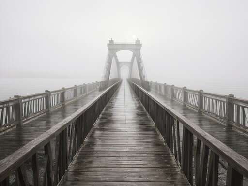 A Wooden Bridge In The Fog
