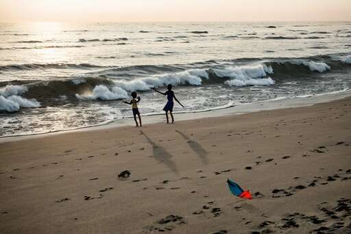 kite flying at beach