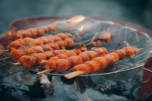 plate of food being cooked on grill