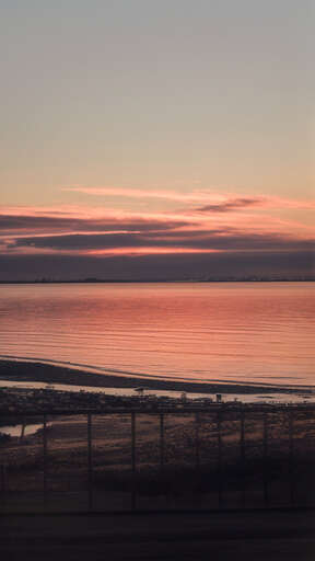 sunset over a body of water 2